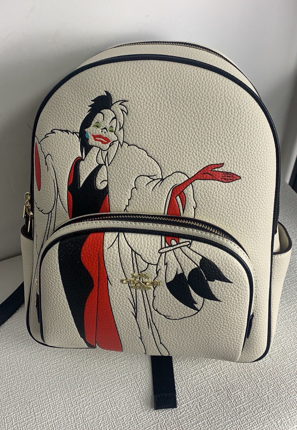 Coach X Disney (CC158) Cruella Motif Mini Pebbled Leather Court Backpack Bag
