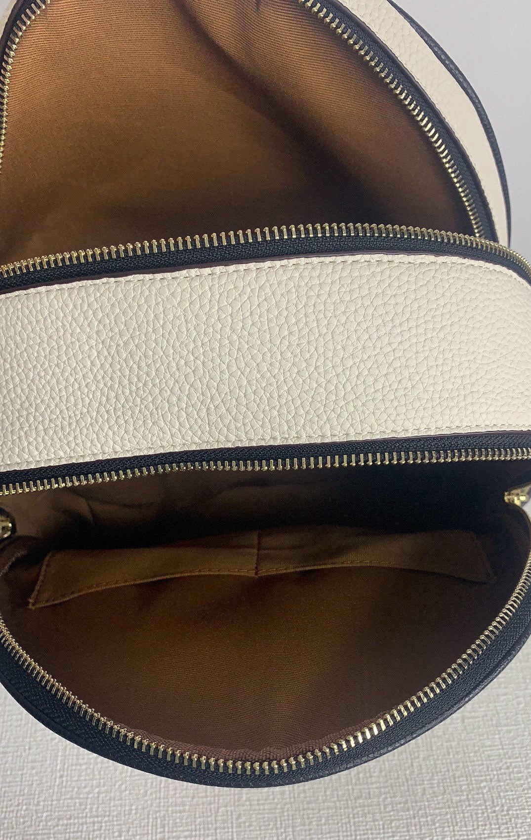 Coach X Disney (CC158) Cruella Motif Mini Pebbled Leather Court Backpack Bag