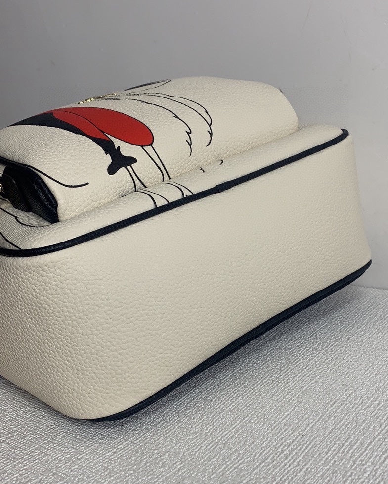 Coach X Disney (CC158) Cruella Motif Mini Pebbled Leather Court Backpack Bag